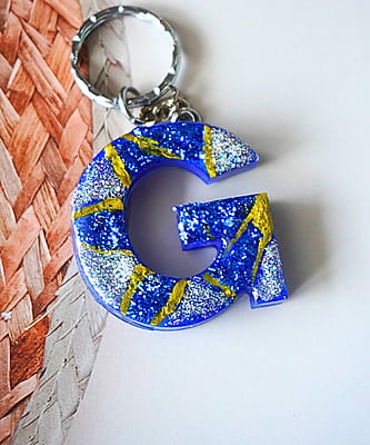 'G' MELANCHOLY LETTER KEYCHAIN 'G' MELANCHOLY LETTER KEYCHAIN