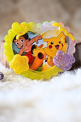 PIKACHU AND CHOTTA BHEEM  IN ONE HEART PHOTO FRAME KEYCHAIN