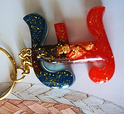 'E' PASSION KEYCHAIN9LKI00013)